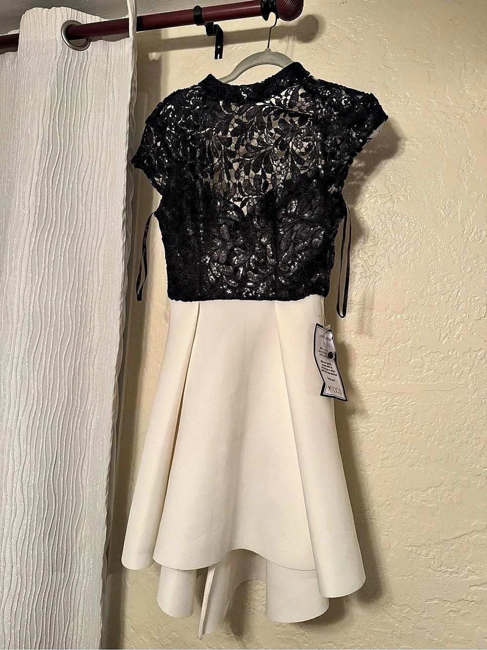 B. Darlin Juniors' Black & White Mock Neck Sequined Lace Hi-Lo Dress